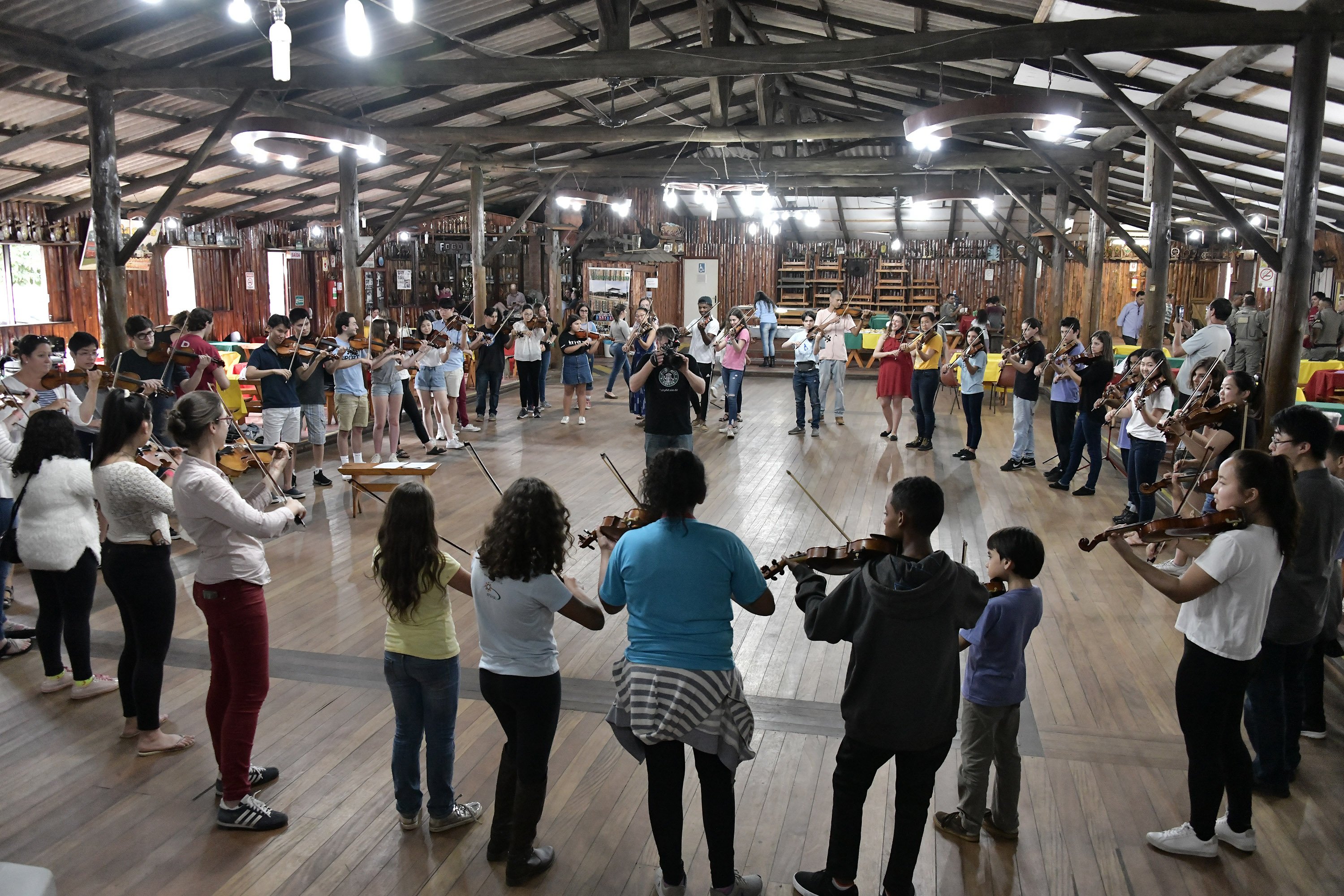 BPYO and IPDAE violinists playing together