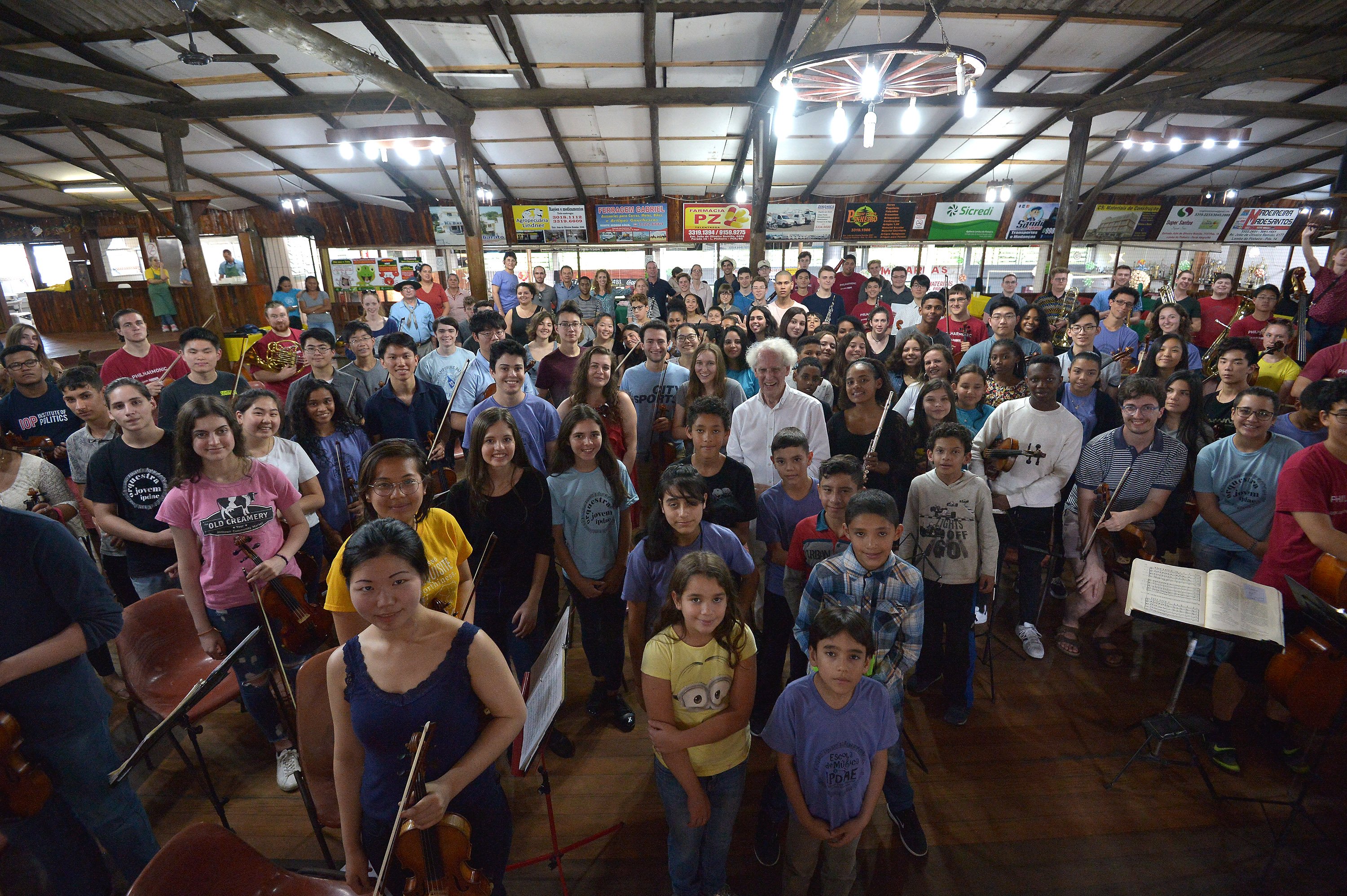 Benjamin Zander with musicians from BPYO and IPDAE